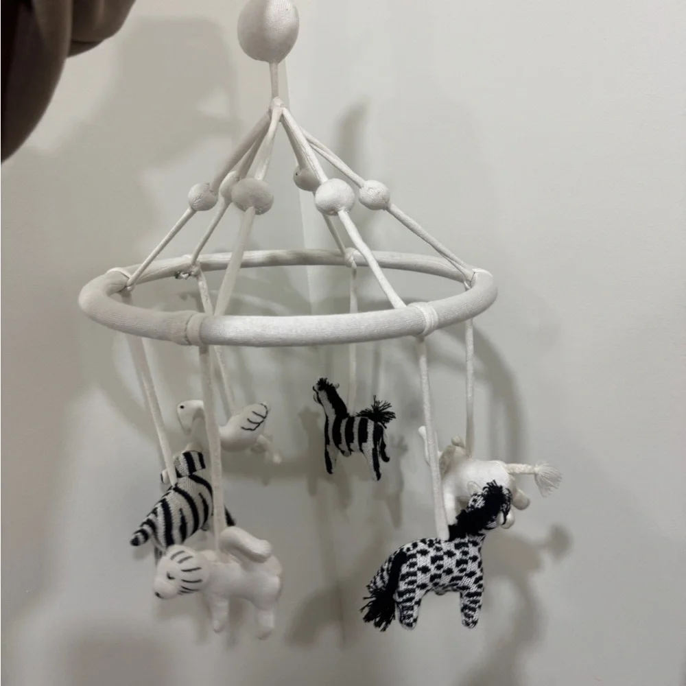 Crate & Barrel Baby Nursery safari animals mobile crib decor newborn neutral